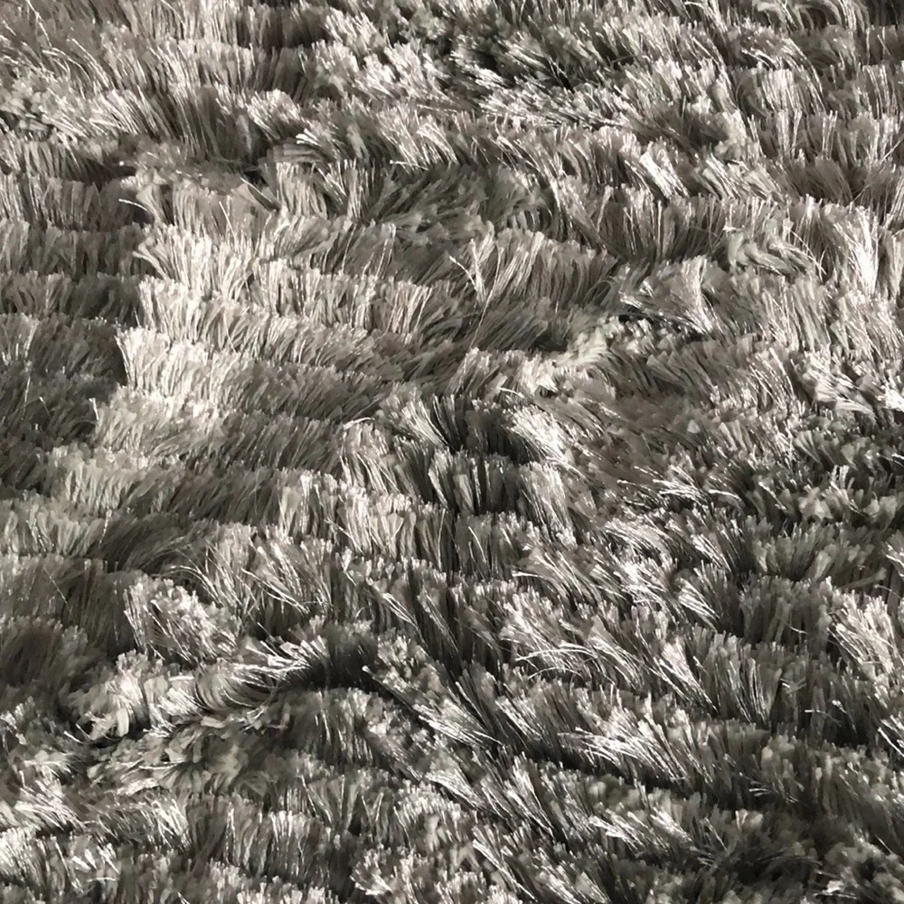 Last chance. Light grey/silver bath rug 1 of 2